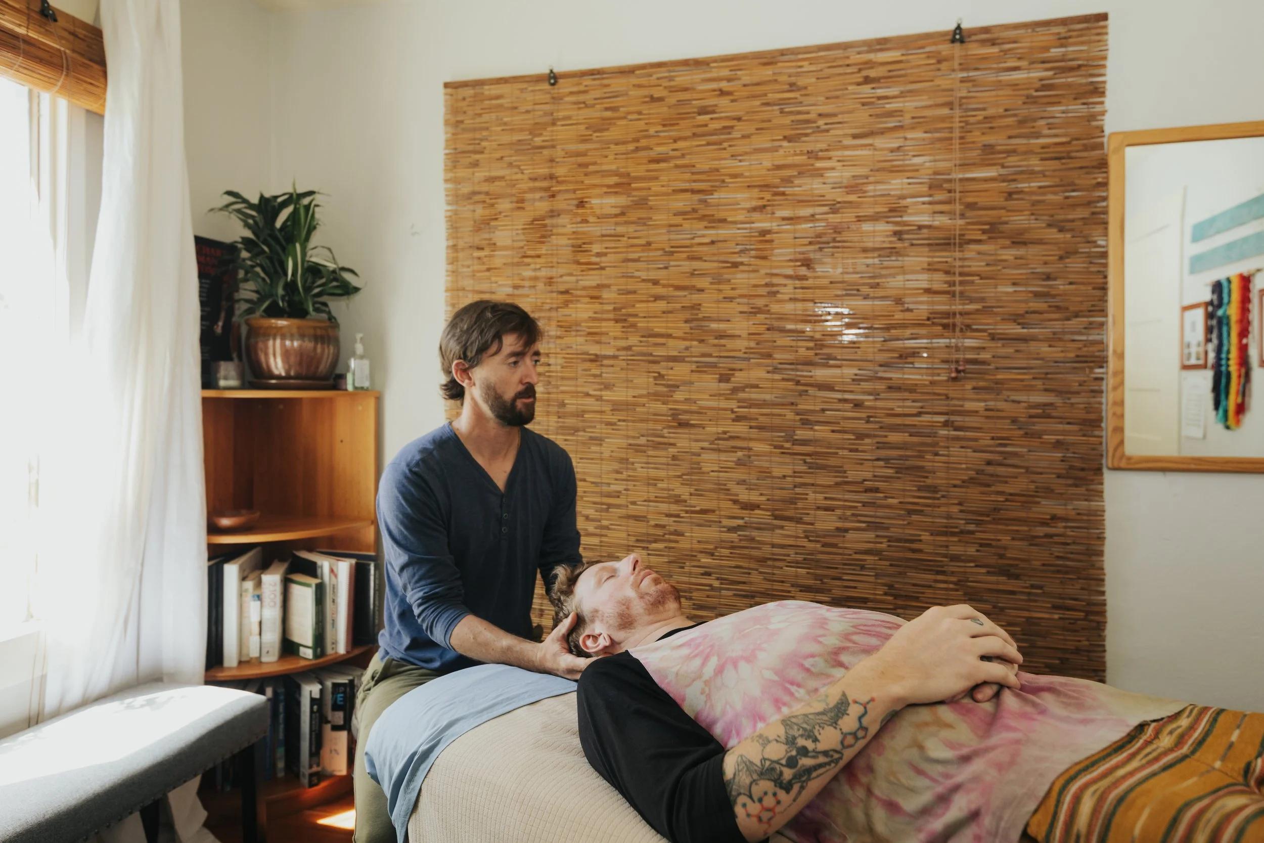 Gentle cranial work during a therapeutic bodywork session